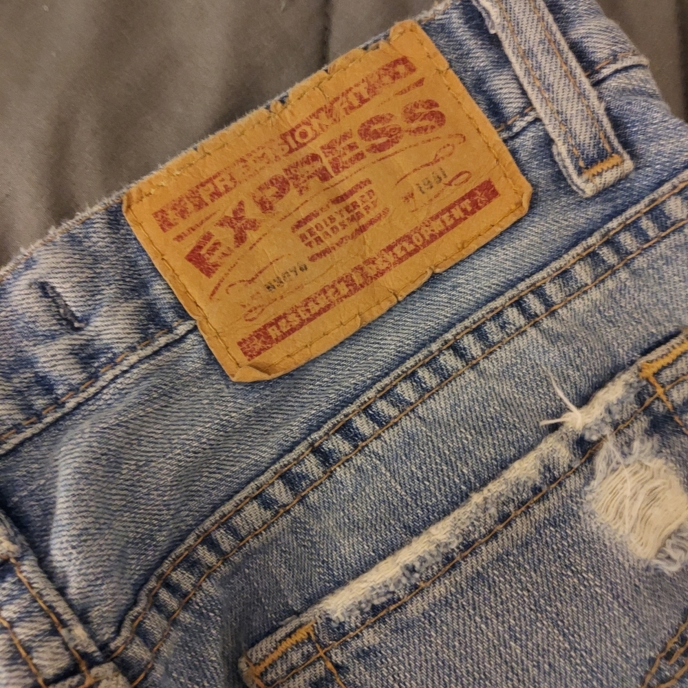 Express ripped bell bottoms
